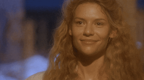 a close up of a woman 's face with blonde hair