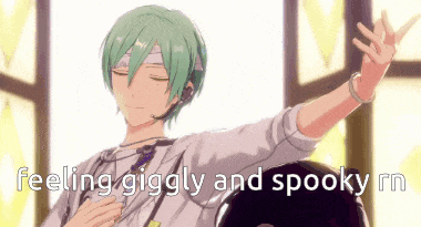 a man with green hair is dancing with the words feeling giggly and spooky .