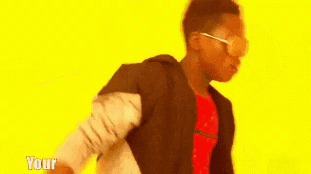 a man wearing sunglasses and a red shirt is dancing in front of a yellow background that says " your welcome "
