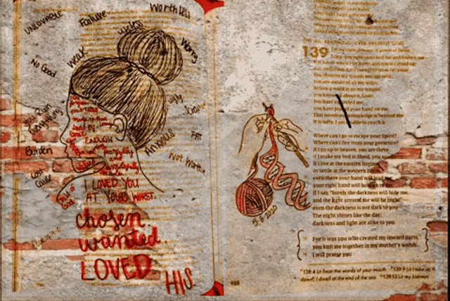 a book is open to a page with a drawing of a woman and the words " chosen wanted loved "