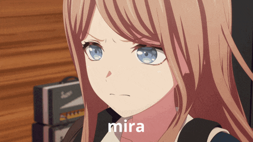 a close up of a girl 's face with the word mira on it
