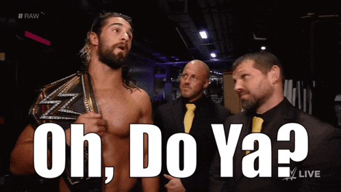 a man with a wrestling belt says " oh do ya " in front of two men