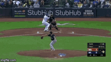 a baseball game is being played in a stadium that is sponsored by pepsi and miller lite