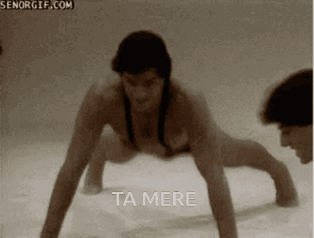 a naked woman is doing push ups with the words ta mere written below her