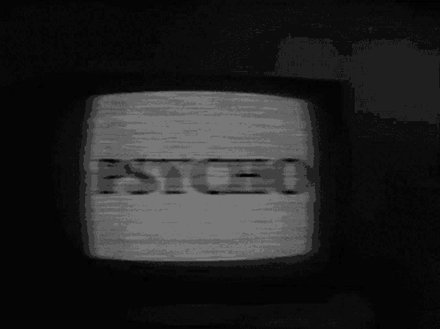 a black and white photo of a tv screen with a static display