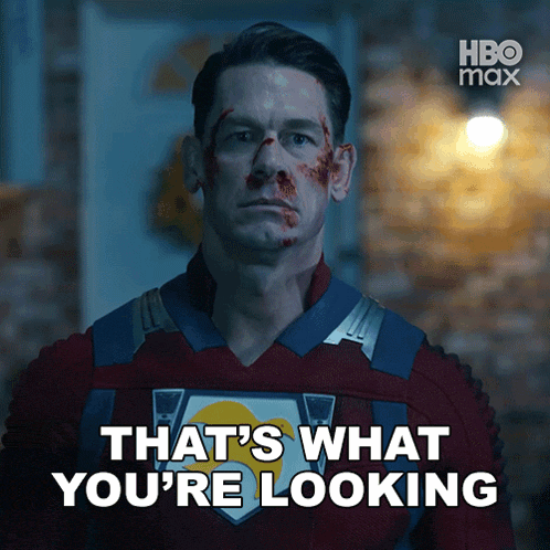 a man in a superhero costume with the words that 's what you 're looking