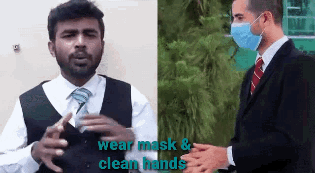 a man in a suit and tie is wearing a mask