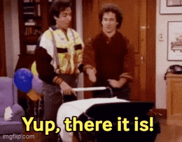 two men are standing next to each other and one of them is pushing a stroller while the other says yup there it is