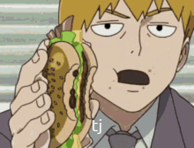 a man in a suit and tie is eating a hamburger with the letters tj on the bottom