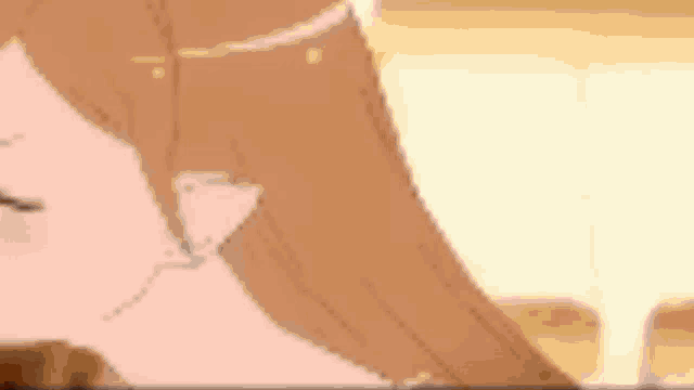 a close up of a person 's face in a cartoon with a blurred background .