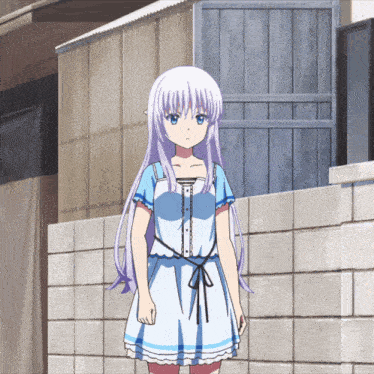 a girl with purple hair and a blue dress is standing in front of a brick wall
