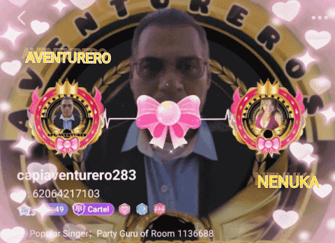 a man with a pink bow in his mouth and the name nenuka