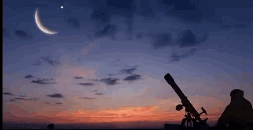 a person is looking through a telescope at the night sky