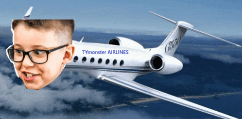 a boy with glasses is flying on a tymonster airlines airplane