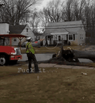 a man in a yellow vest is standing in front of a red truck with the words " fuck it " on the bottom