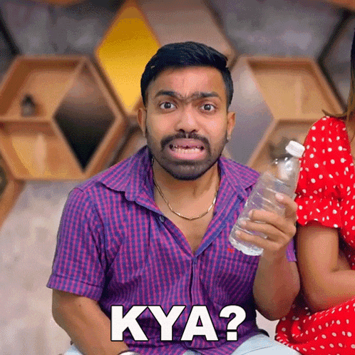 a man in a plaid shirt is holding a bottle of water and asking kya