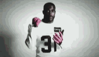 a man in a white jersey with the number 3 on it