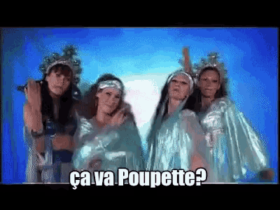 a group of women standing next to each other with the words " ca va poupette " written on the bottom