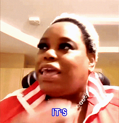a woman wearing a red and white striped jacket says " it 's "