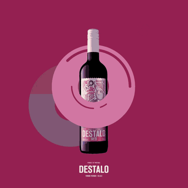 a bottle of destalo red wine is surrounded by flip flops and a pink umbrella