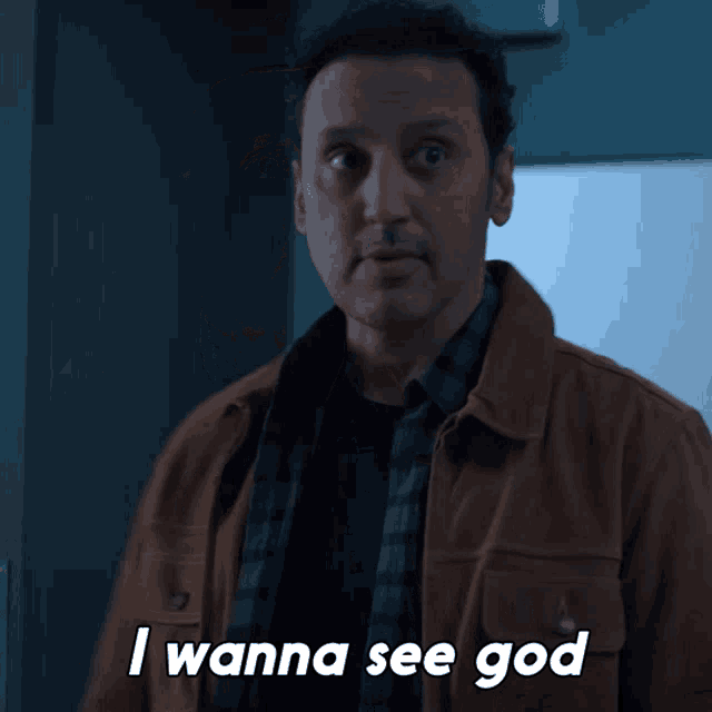 a man says i wanna see god in a dark room