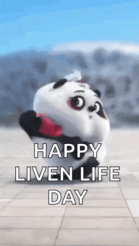 a cartoon panda bear is holding a red heart and says `` happy liven life day '' .