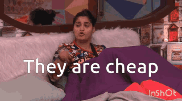 a woman is laying on a bed with the words they are cheap written on the bottom