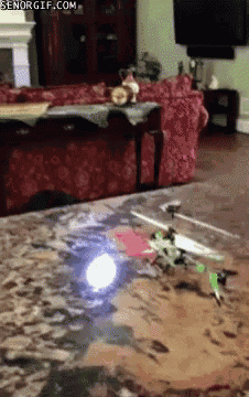 a remote control helicopter is flying in a living room with senorgif.com written on the bottom