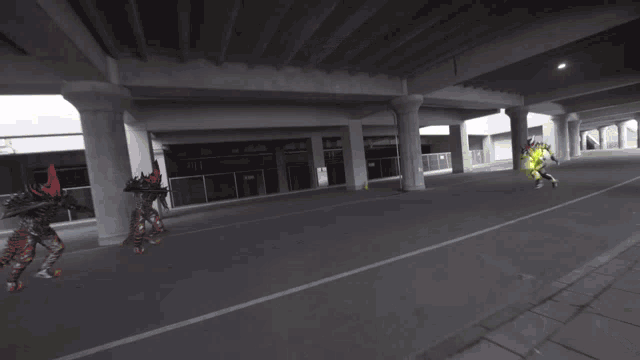 a person riding a motorcycle under a bridge with a yellow light coming out of it