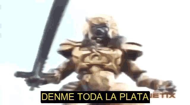 a statue with a sword and the words denme toda la plata written below it