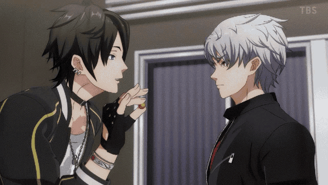 two anime characters standing next to each other with tbs on the bottom
