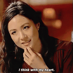 a woman says i think with my heart while smiling