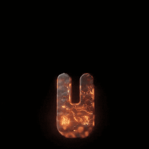 a fireball with smoke coming out of it and a black background