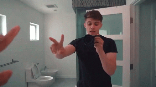 Peace Out Singing On The Mirror GIF - Peace Out Singing On The Mirror Filming GIFs