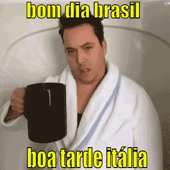 a man in a bathrobe is holding a coffee mug and says bom dia brasil