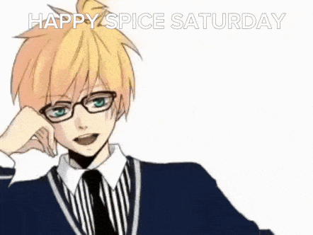 a boy wearing glasses and a blue suit is smiling and says happy spice saturday .