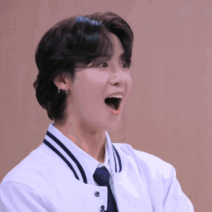 a person with their mouth open and a sticker that says ' wlw ' on it