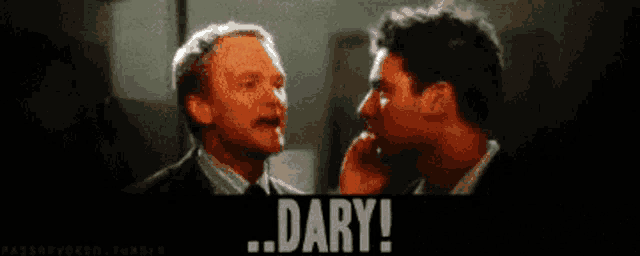 two men are talking to each other and one of them is saying dary