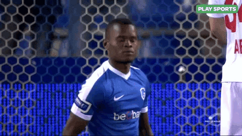 a soccer player wearing a blue be ba jersey