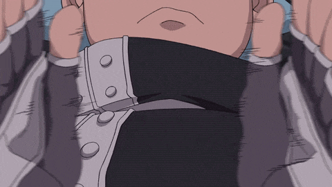a close up of a person 's chest with buttons