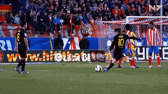 a soccer player wearing a number 10 jersey kicking a soccer ball