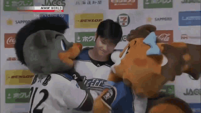 a mascot with the number 12 on their jersey