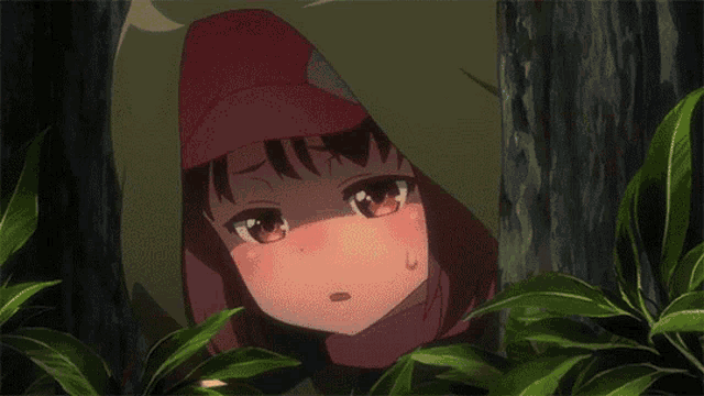 a close up of an anime character 's eye with a red light coming out of it .