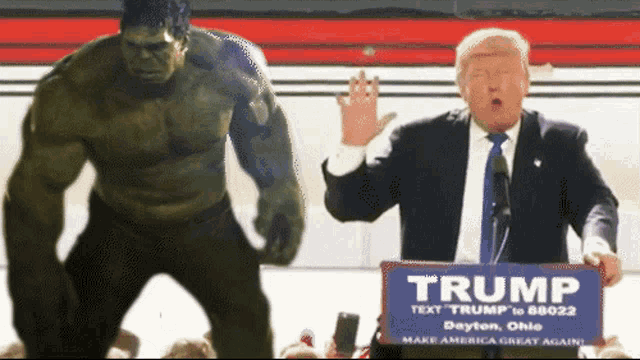 the hulk is standing next to donald trump who is holding a trump sign