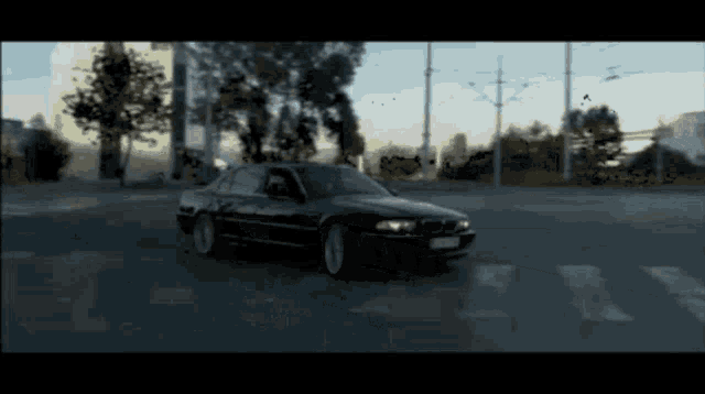 a black car with a license plate that says bmw