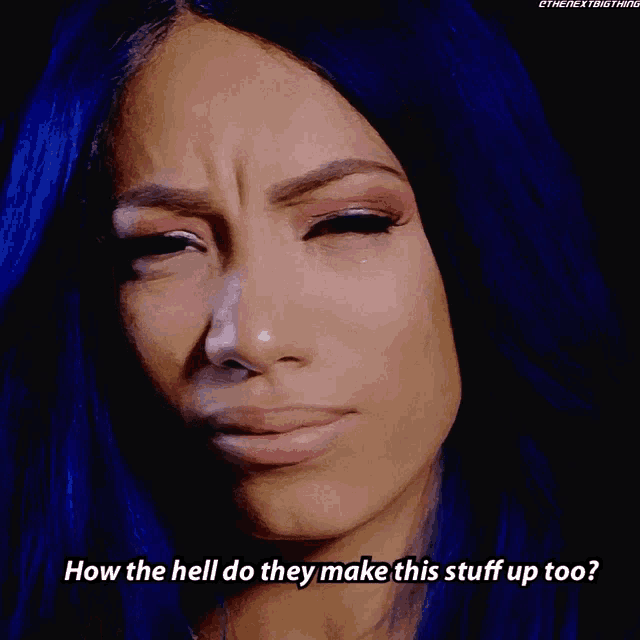 a close up of a woman with blue hair asking how the hell do they make this stuff up too