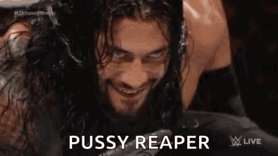 a man with long hair and a beard is smiling and says pussy reaper .