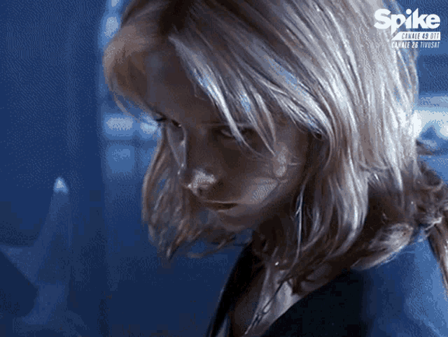 a close up of a woman 's face with the words spike channel 48 on the bottom