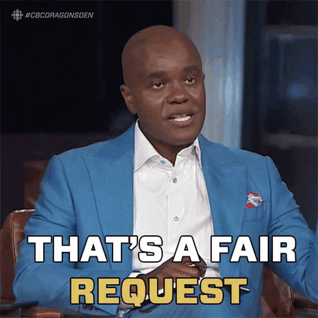 a man in a blue suit and white shirt says " that 's a fair request "