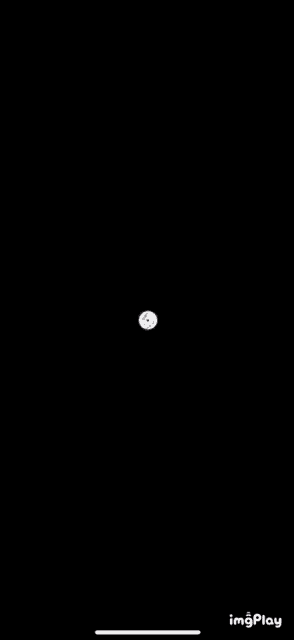 a black background with a white circle in the middle .